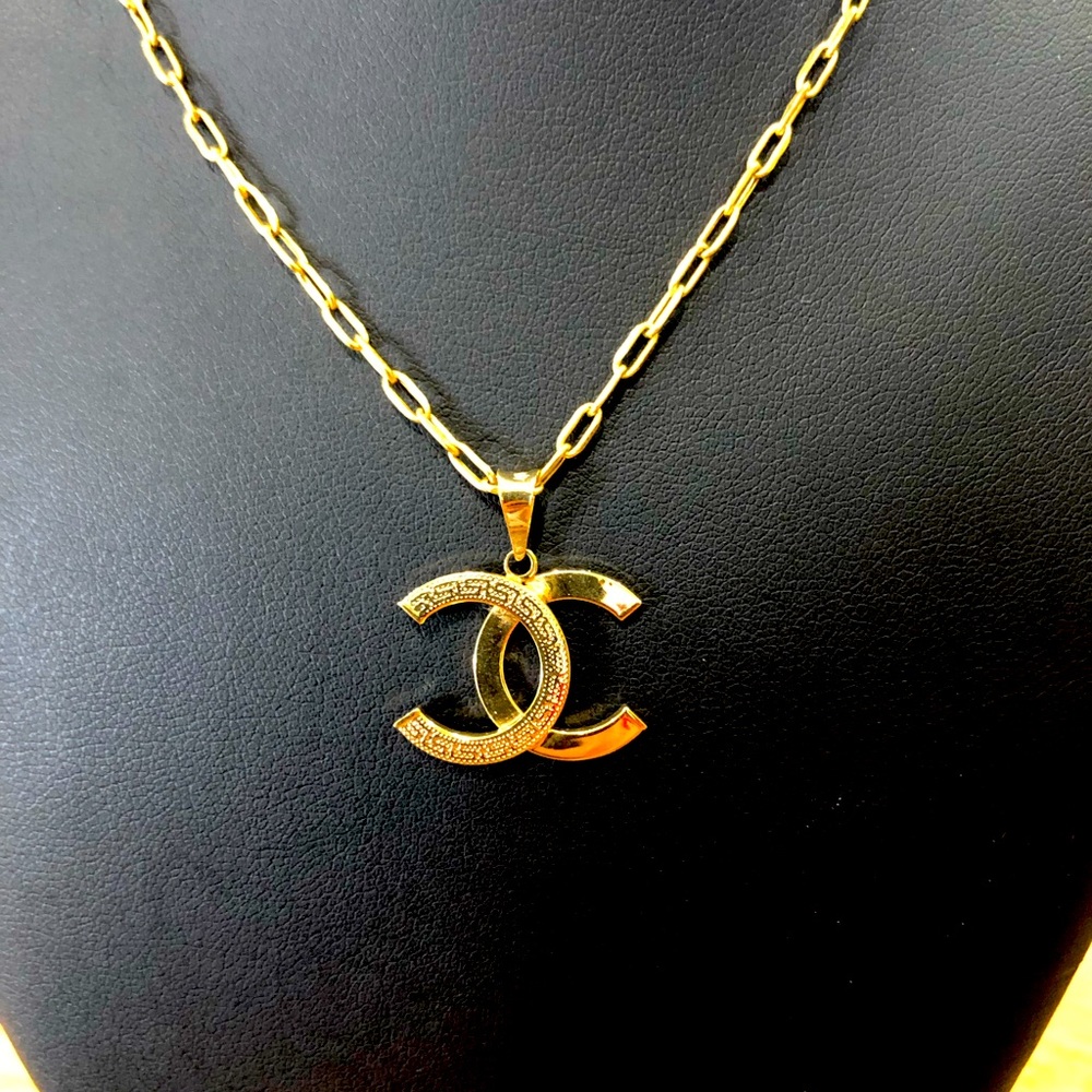 Brand New 18K SOLID GOLD (not filled or plated) CC pendant. CHAIN NOT INCLUDED!